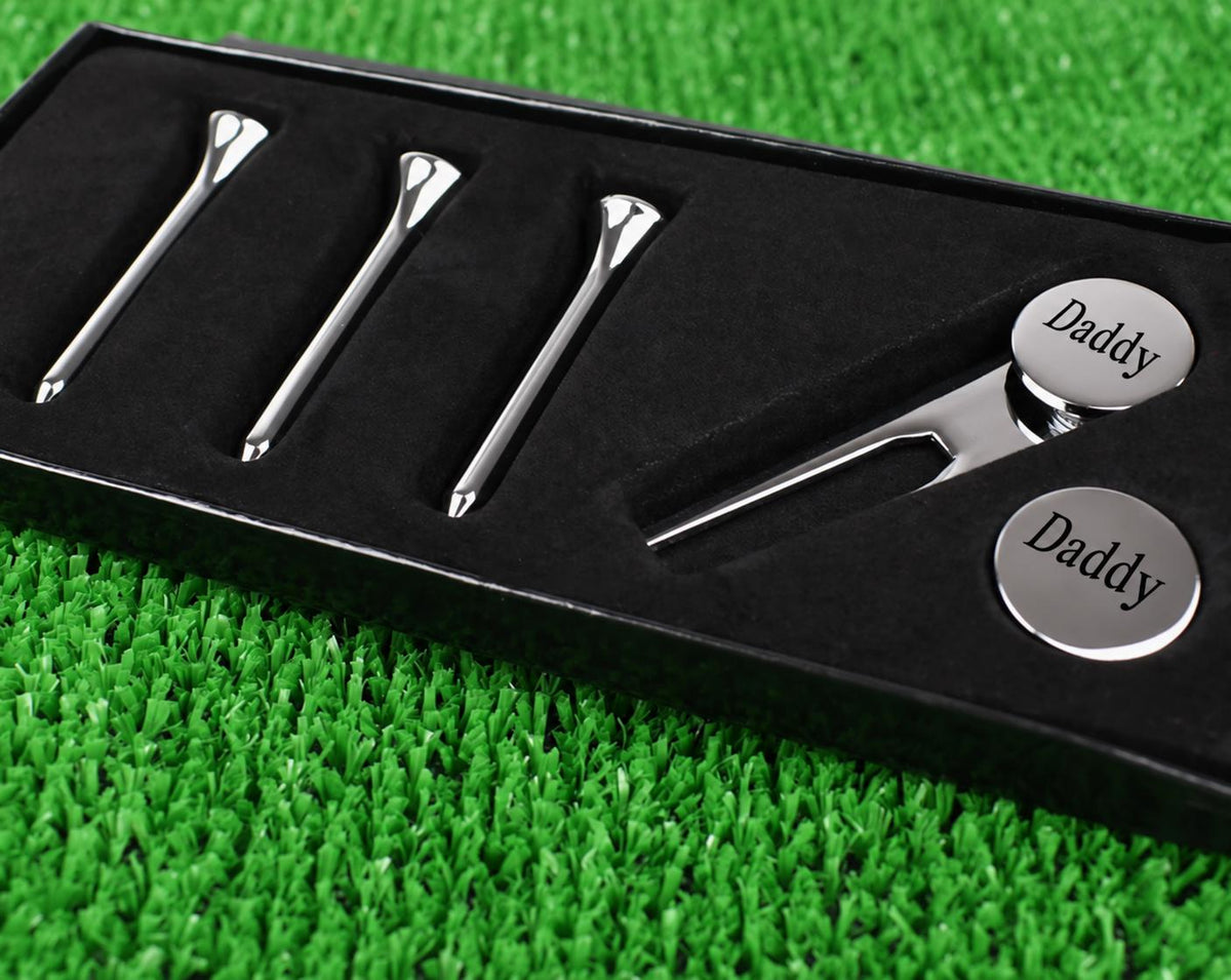 Personalised golf set with three tees, a pitch repairer and an engraved initials ball marker.