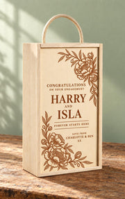 Personalised engagement wine gift box for Harry and Isla with floral engraving, a rope handle and the message Forever Starts Here.