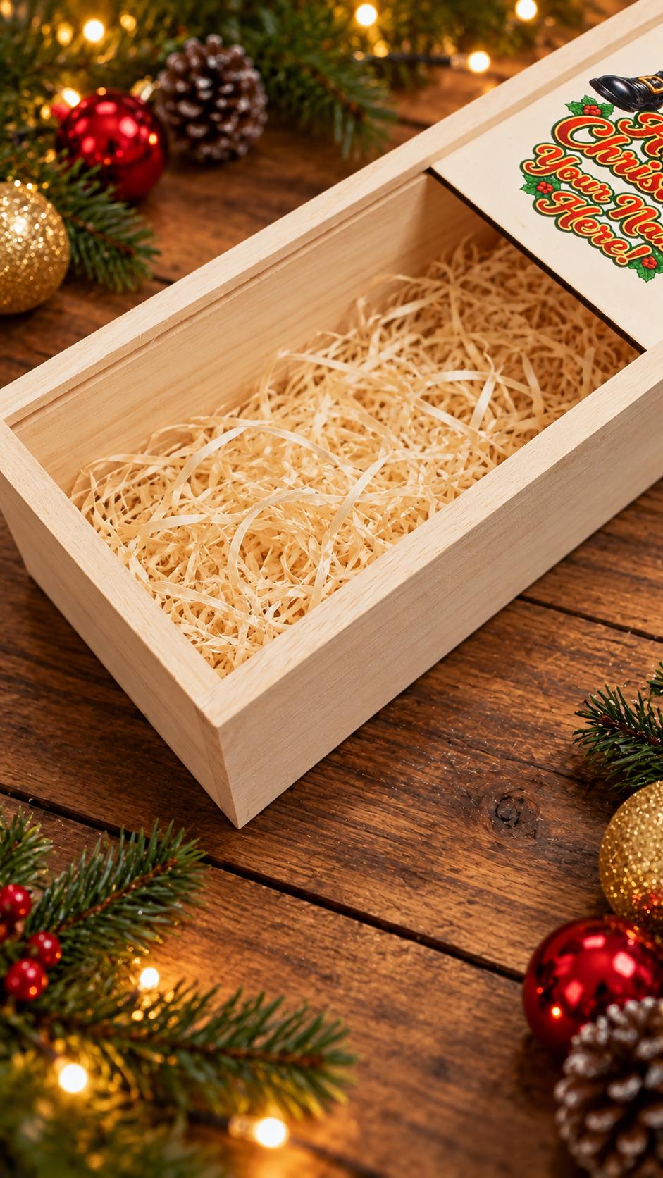 Winking Christmas tree holding a wine glass, decorated with gold ribbon and baubles above Happy Christmas wording and a name placeholder.