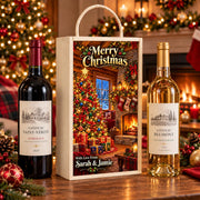Personalised wooden double wine box with Christmas tree and fireplace artwork, Merry Christmas lettering and Sarah & Jamie message, beside two wine bottles.