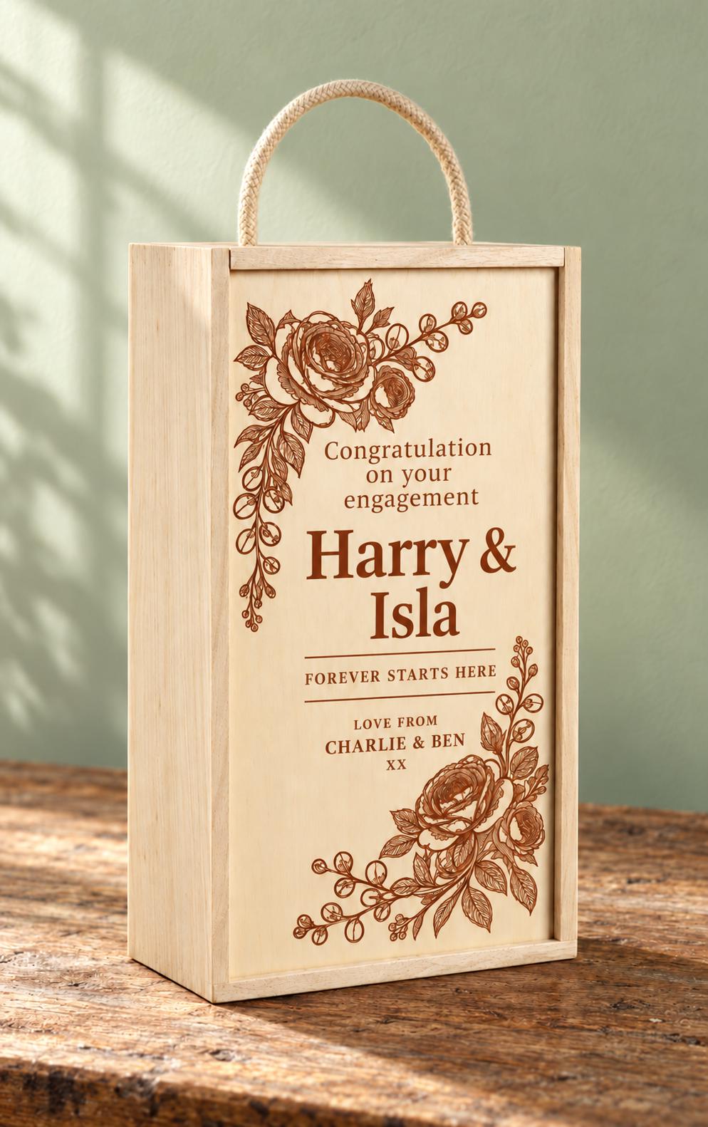 Floral engraved two-bottle wooden gift box with a congratulations message for Oliver and Amelia and a dedication from Sophie and James.