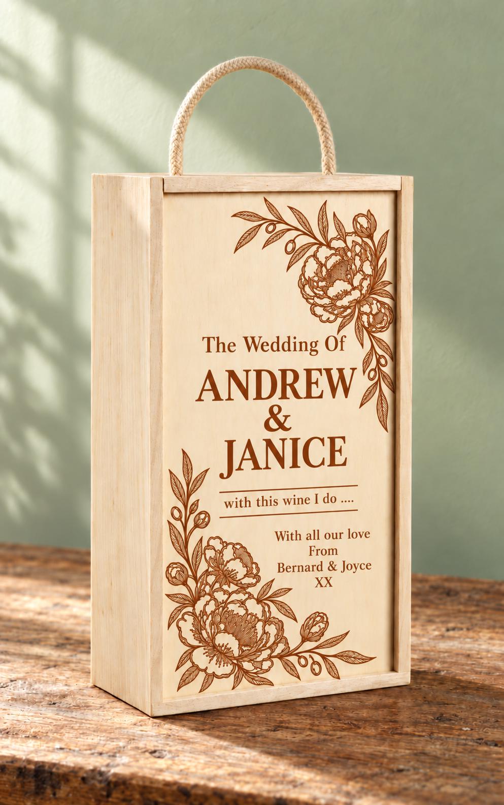 Personalised engagement wine gift box for Harry and Isla with floral engraving, a rope handle and the message Forever Starts Here.