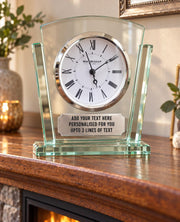 Personalised glass mantel clock on a wooden mantelpiece, featuring a Roman numeral dial, silver bezel and custom message plaque.