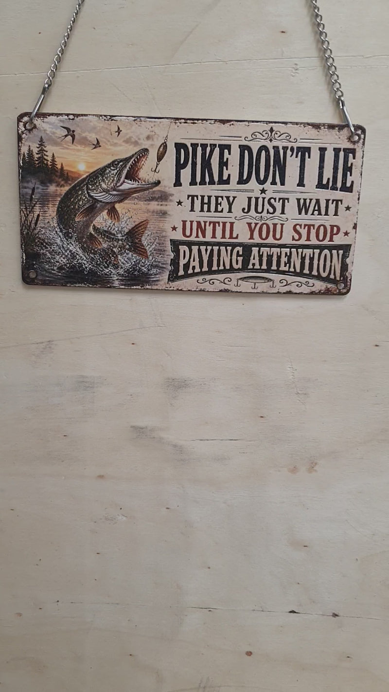 Funny "Pike Don't Lie" acrylic hanging fishing sign featuring a leaping Northern Pike and vintage distressed artwork, complete with metal hanging chain for man caves, fishing lodges and anglers.